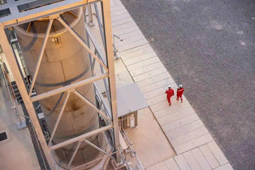 Oil and gas industry workers inspecting equipment in Dubai.