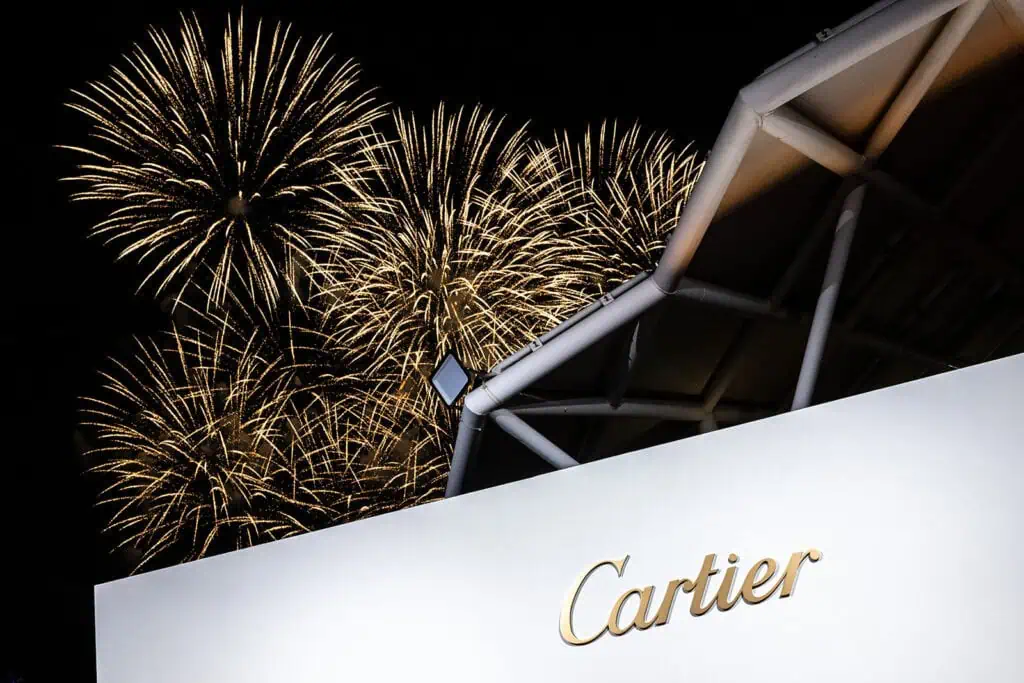Fireworks display at Cartier event in Dubai during night.