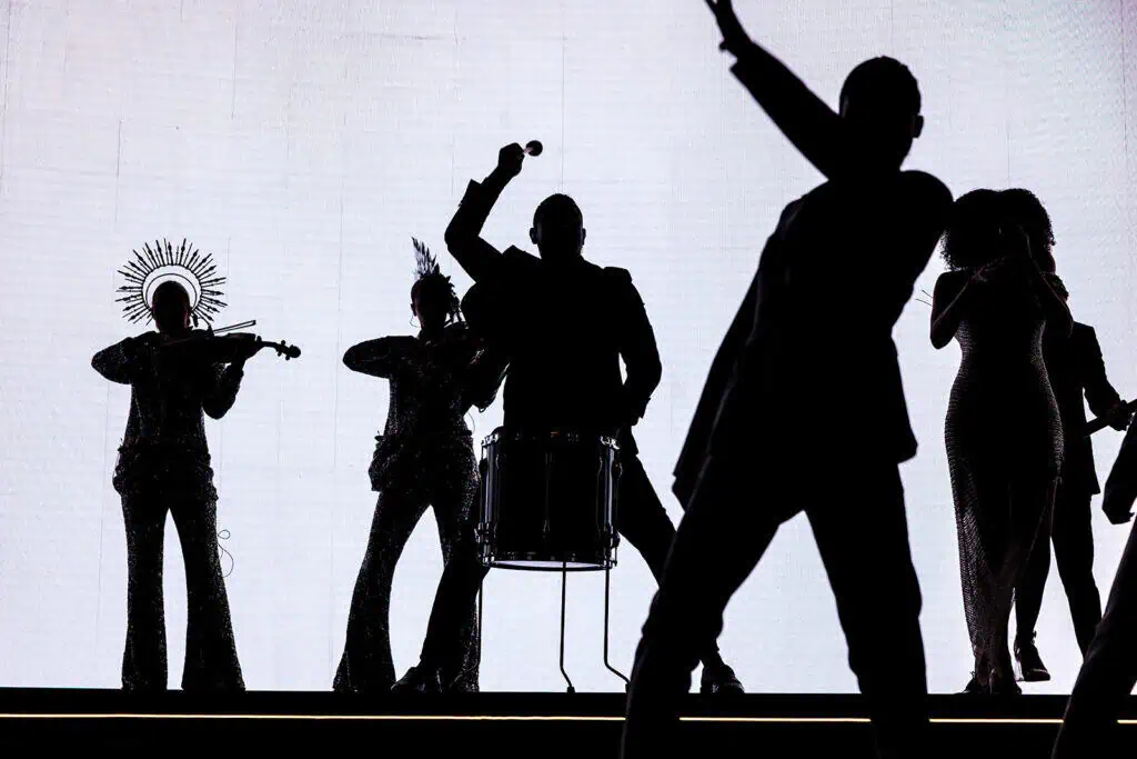 Silhouettes of performers during a corporate event in Dubai.